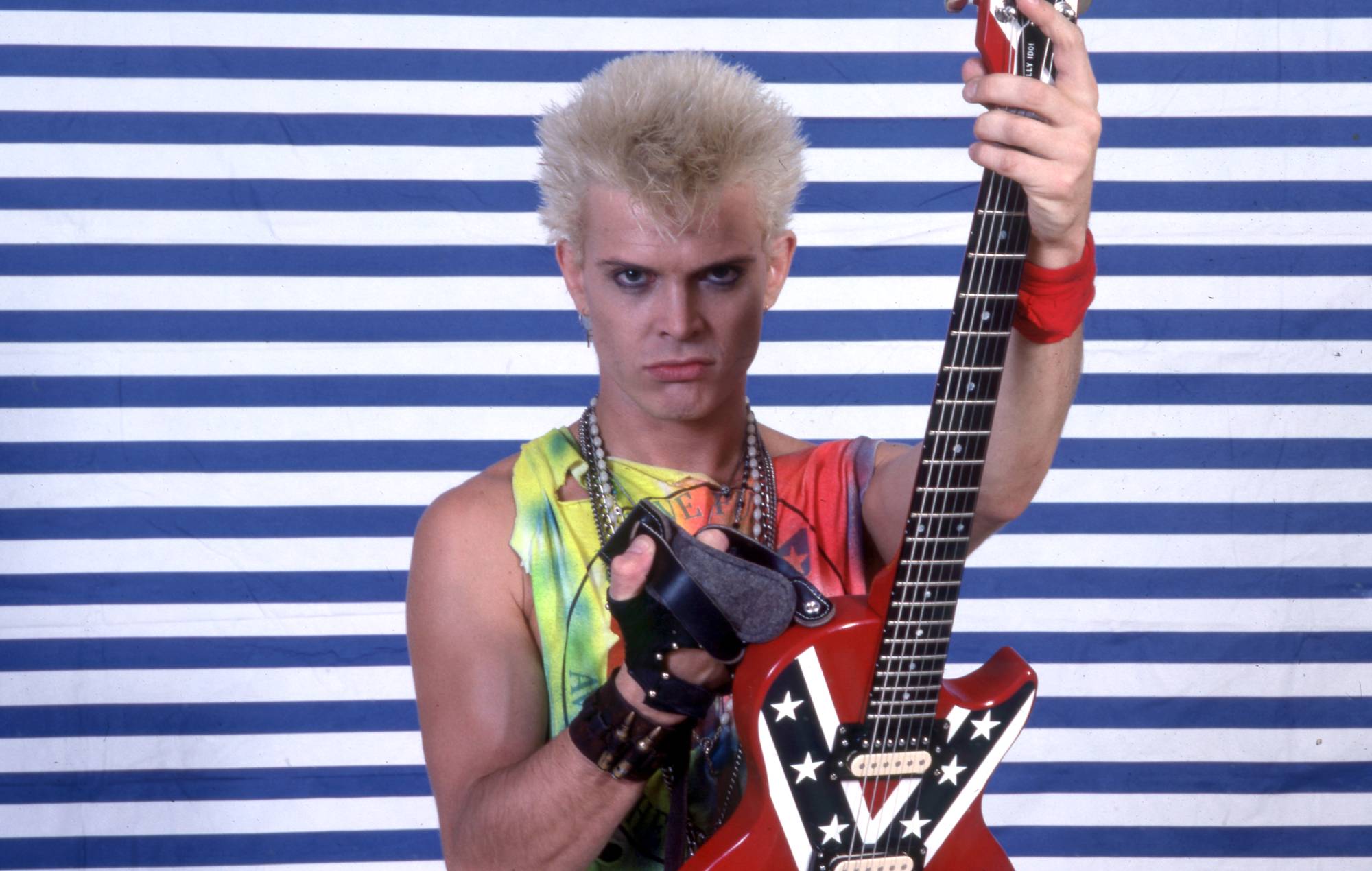 English musician, singer, songwriter, and actor, Billy Idol, poses backstage on May 23, 1987, at the Pine Knob Music Theater in Clarkston, Michigan. (Photo by Ross Marino/Getty Images)